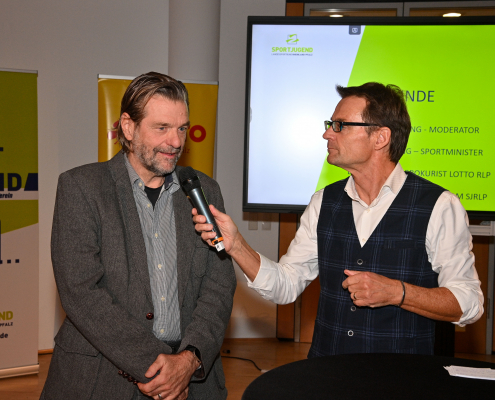 Moderator Christian Döring interviewt Dirk Martin (Prokurist Lotto RLP)
